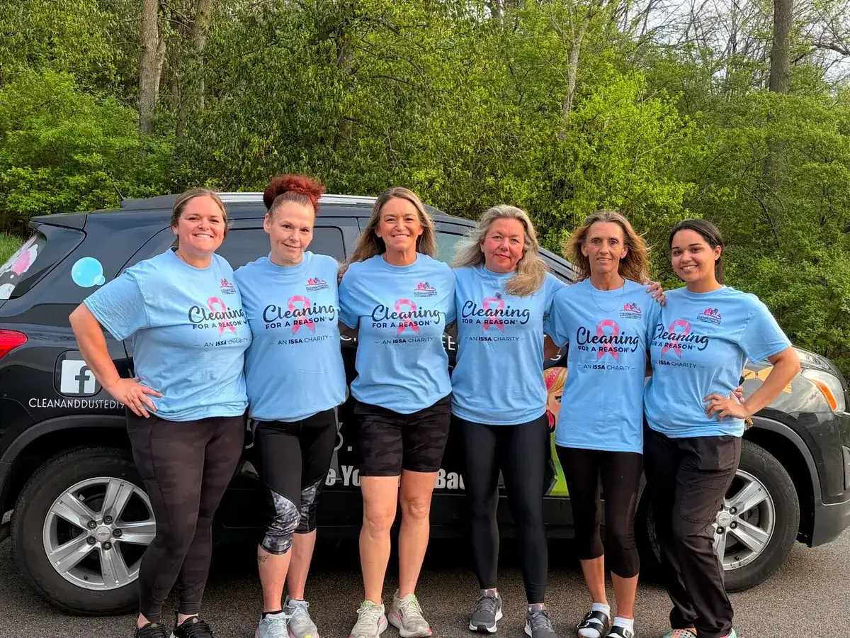 Clean and Dusted team in Cleaning for a Reason shirts